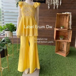 It is a beautiful peplum top which comes with stylish bell bottom pants.